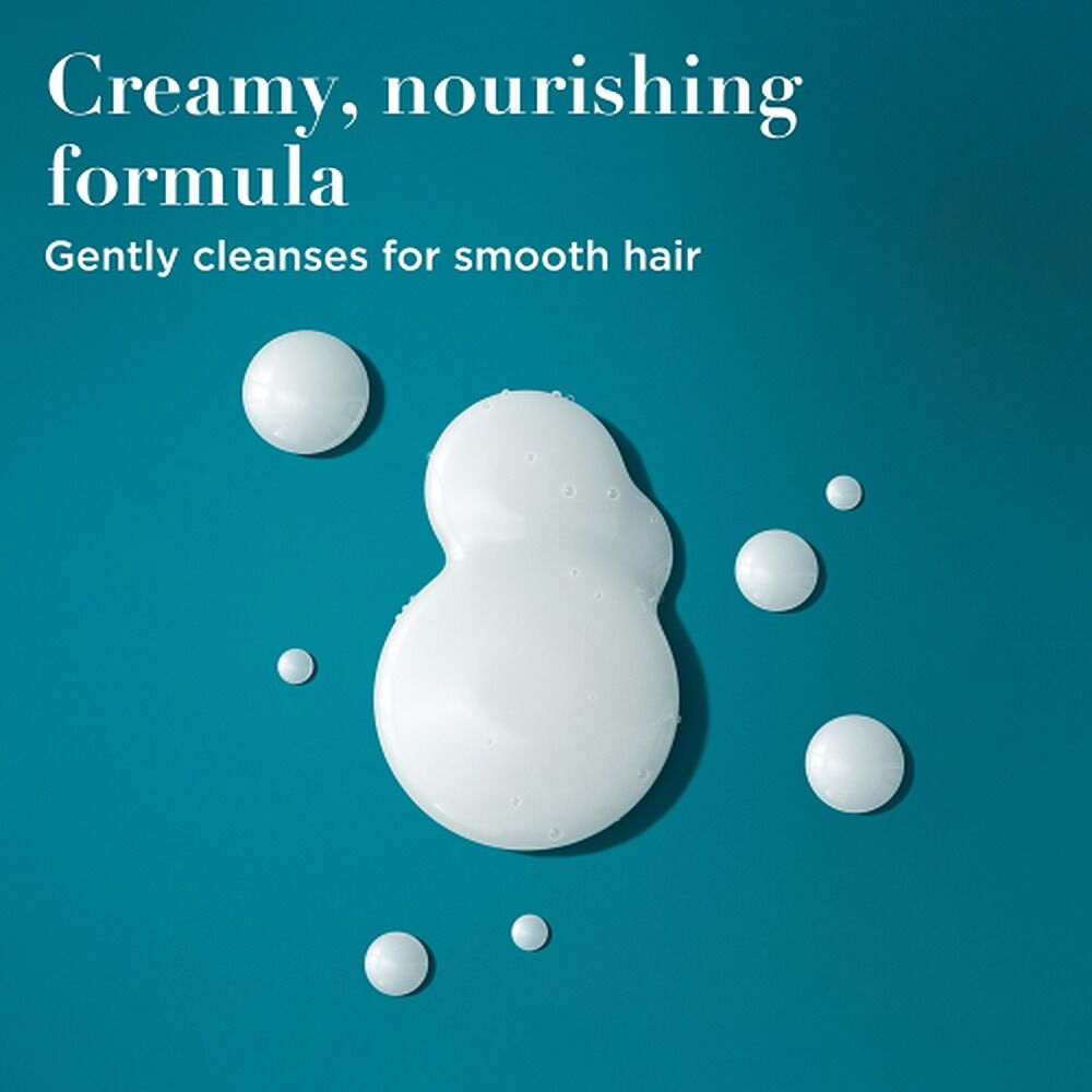 OGX Nourishing+ Coconut Milk Shampoo 385mL