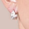 Culturesse Olli Textured Sculpture Huggie Earrings (Silver)