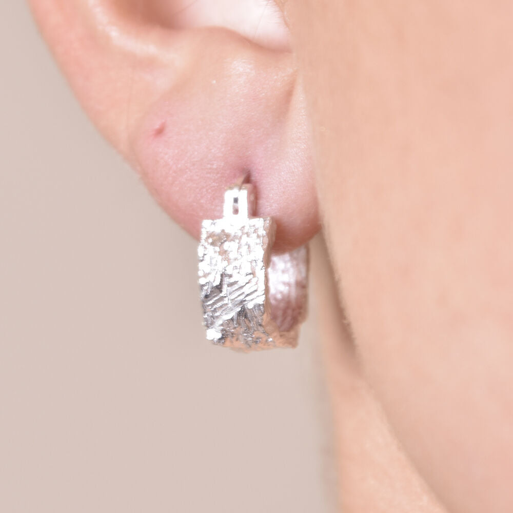 Culturesse Olli Textured Sculpture Huggie Earrings (Silver)